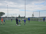 Laatste training S.K.N.W.K. JO10-1 (partijtje tegen de ouders) van woensdag 22 mei 2024 (21/133)